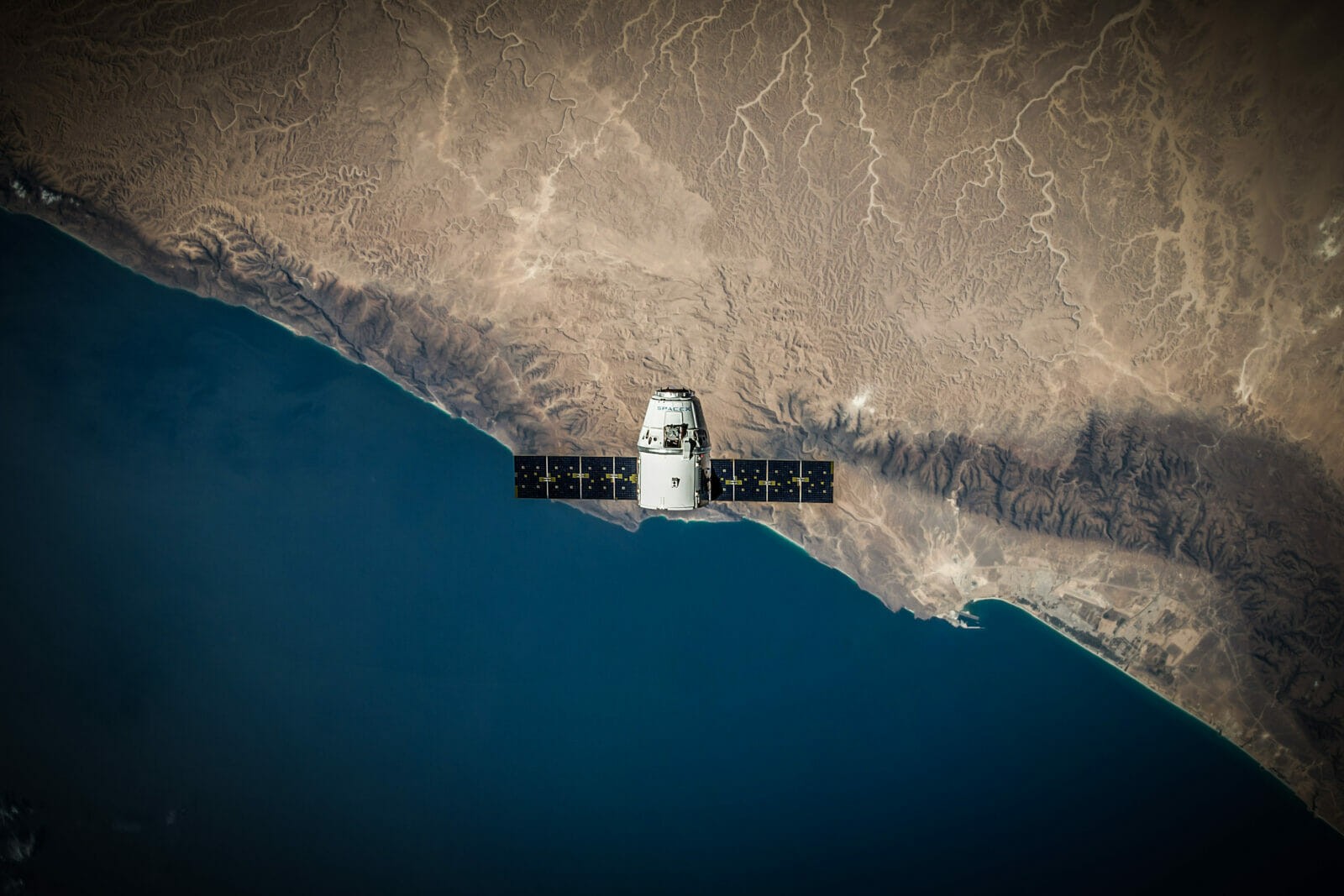 Satellite mission in space from the top looking down to earth